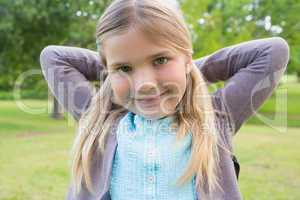 Close-up of a cute smiling girl at park