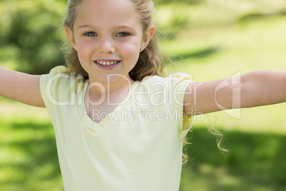 Portrait of a cute smiling girl at park