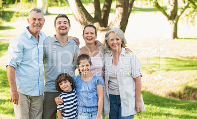 Portrait of a happy extended family in park