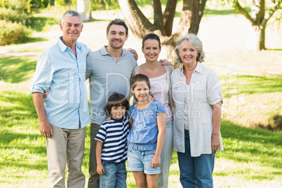 Portrait of a happy extended family in park