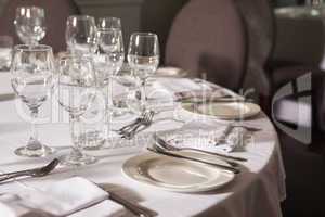 Set table with white linen