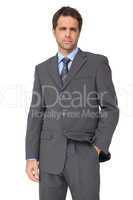 Handsome businessman looking at camera