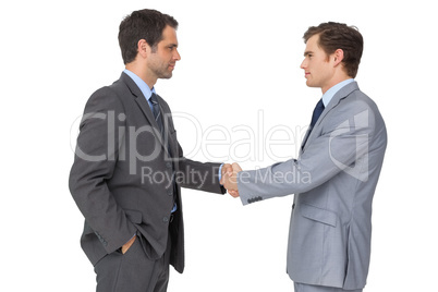 Smiling business team shaking hands