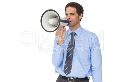 Handsome businessman talking through megaphone