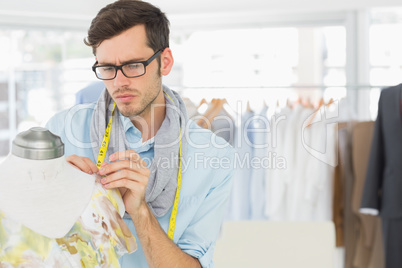 Fashion designer working on floral dress