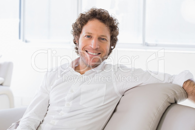 Portrait of a well dressed young man at home