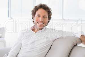 Portrait of a well dressed young man at home