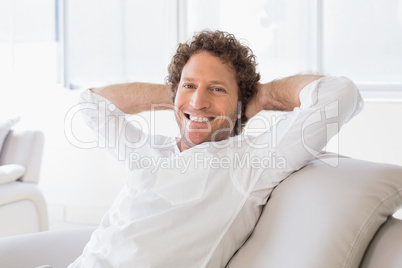 Portrait of a well dressed young man at home