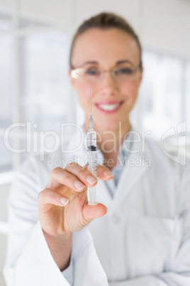 Female doctor holding an injection in hospital