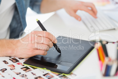 Designer working with digitizer at his desk