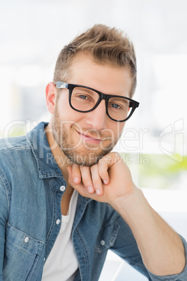 Handsome designer smiling at camera