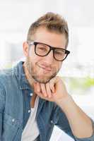 Handsome designer smiling at camera