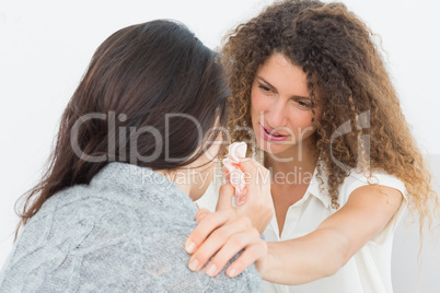 Therapist comforting her upset patient