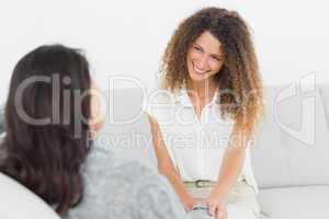 Therapist smiling at her patient