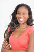 Pretty designer smiling at camera in front of whiteboard