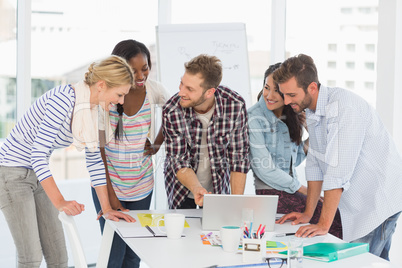 Smiling team of designers having a meeting