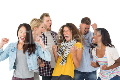 Happy group of young friends cheering