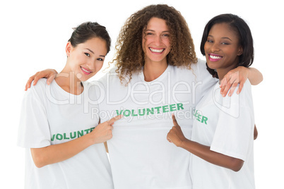 Attractive team of volunteers smiling at camera