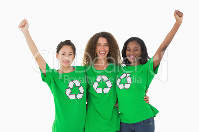 Team of environmental activists cheering at camera