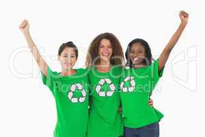 Team of environmental activists cheering at camera