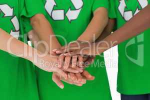 Environmental activists putting hands together