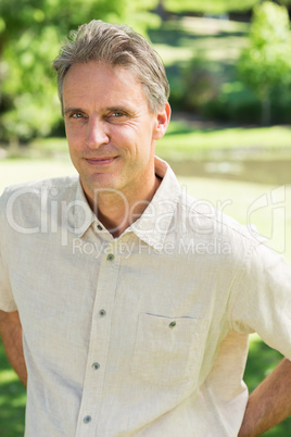 Confident man standing in park