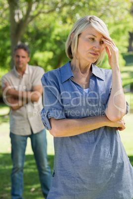 Upset couple in park