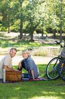 Couple enjoying picnic in park