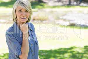 Beautiful woman smiling in park