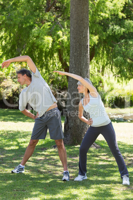 Couple exercising in the park