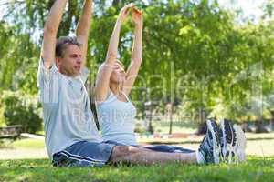 Couple exercising in the park