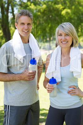 Happy couple after a workout in park