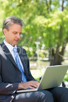 Businessman using laptop