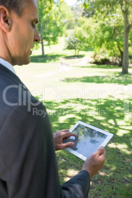 Businessman using tablet PC