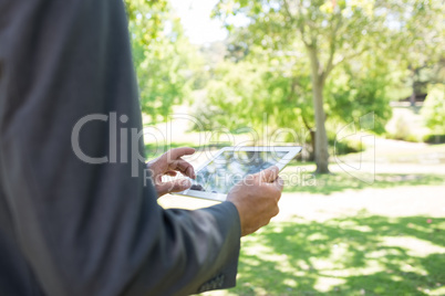 Businessman using tablet computer