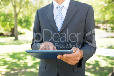 Businessman using digital tablet