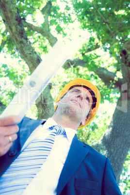 Architect holding blueprint