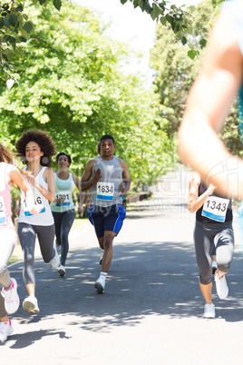 Runners racing in marathon