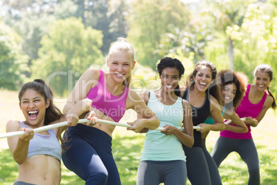 Women pulling a rope in tug of war