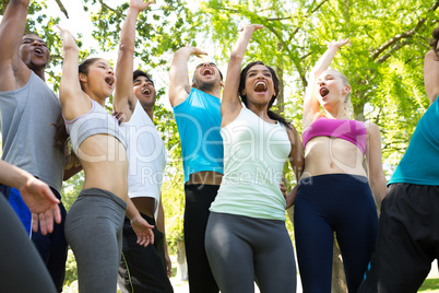 Sporty friends screaming at park