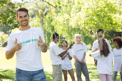 Handsome volunteer showing thumbs up