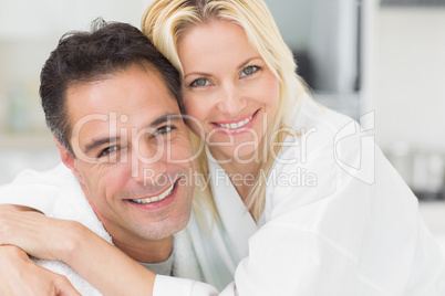 Closeup portrait of a woman embracing man