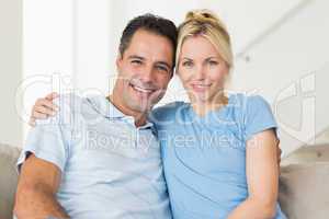 Portrait of a loving couple in living room