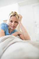 Portrait of a beautiful woman sitting in living room