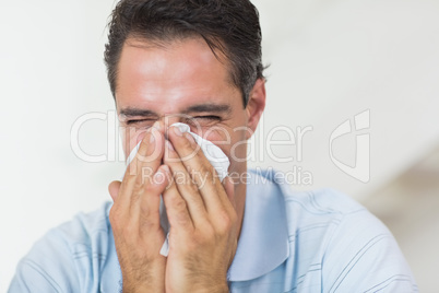 Closeup of a man suffering from cold