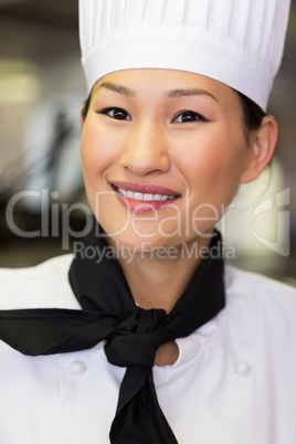 Closeup of a female cook in kitchen