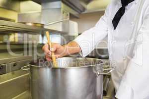 Male chef preparing food in kitchen