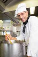 Male chef preparing food in kitchen