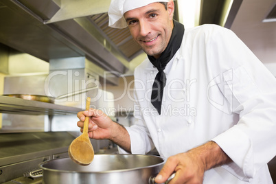 Male chef preparing food in kitchen