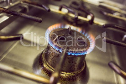 Burning gas on kitchen gas stove
